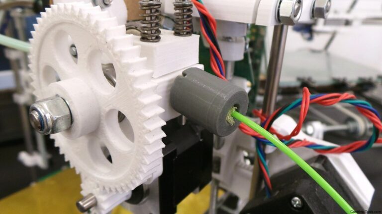 Filament d'impression 3D et pièce imprimée, illustrant les matériaux PLA, PETG et ABS